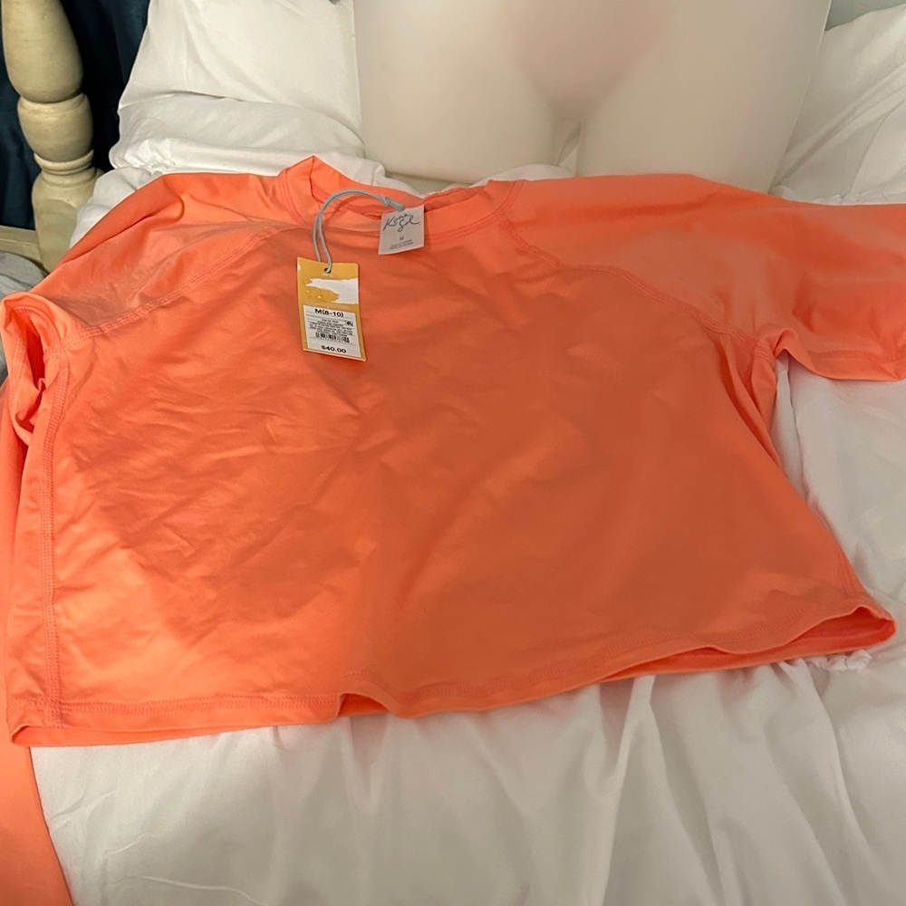 Kona sol Vibrant Salmon Sports Tee